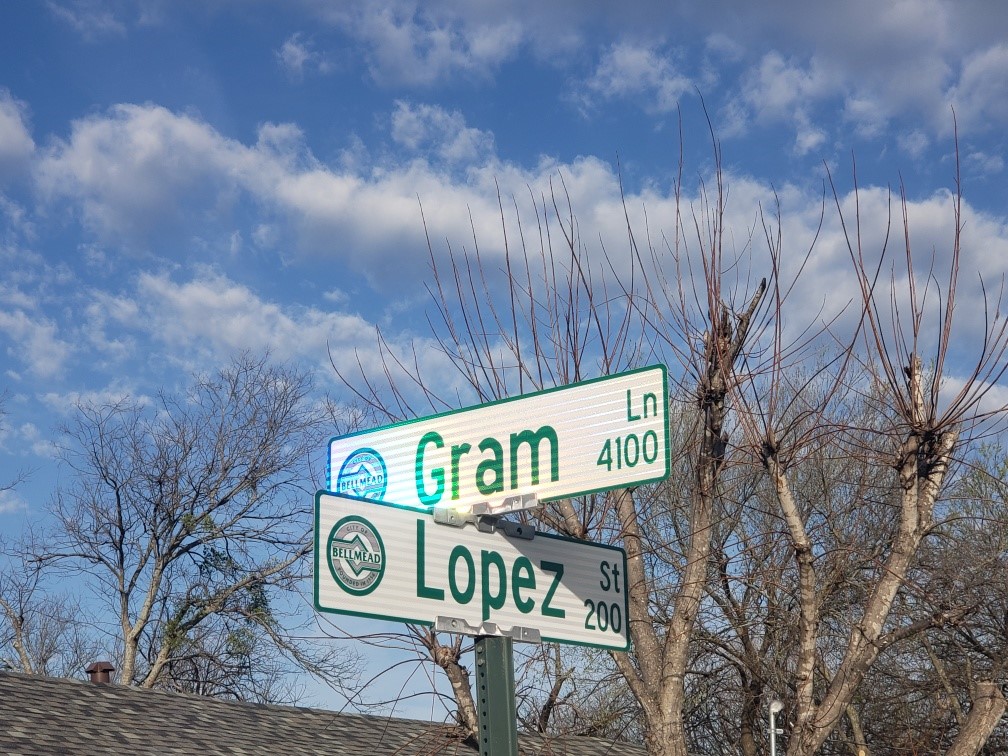 Gram and Lopez street signs