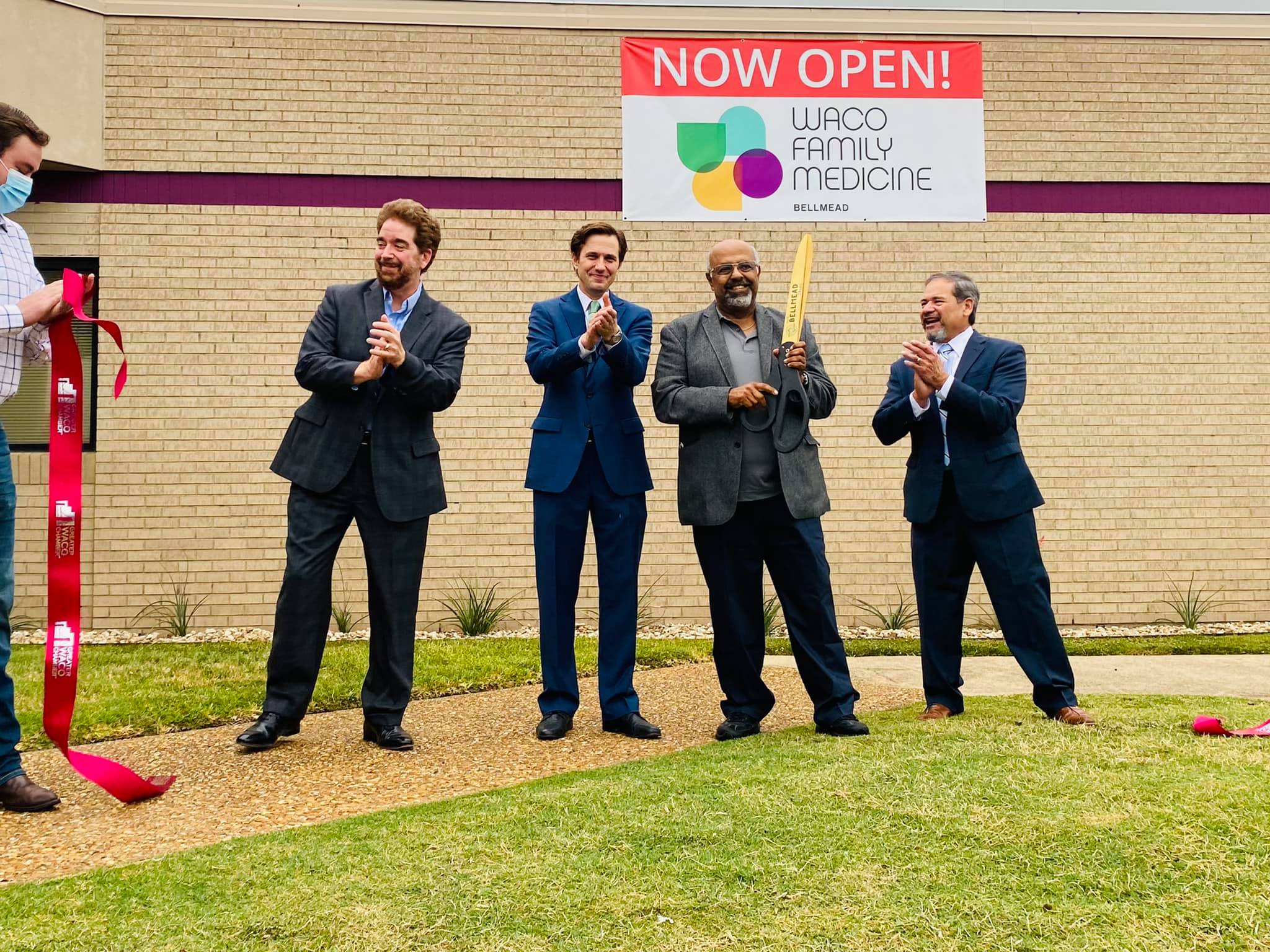 Men at a Ribbon Cutting
