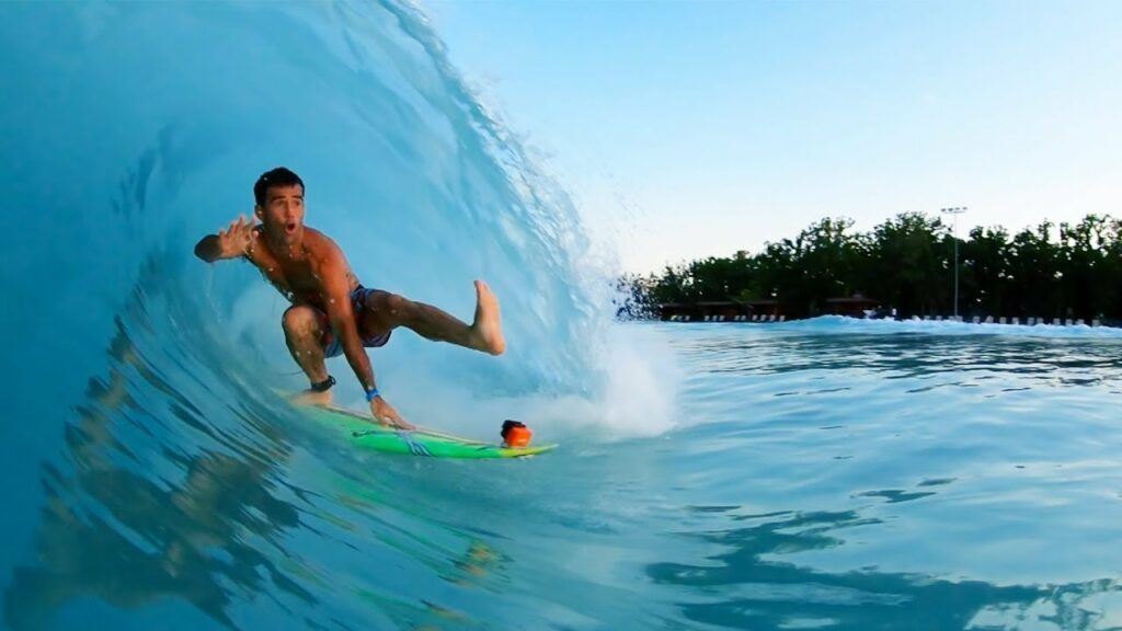 Man Surfing in a Wave Pool
